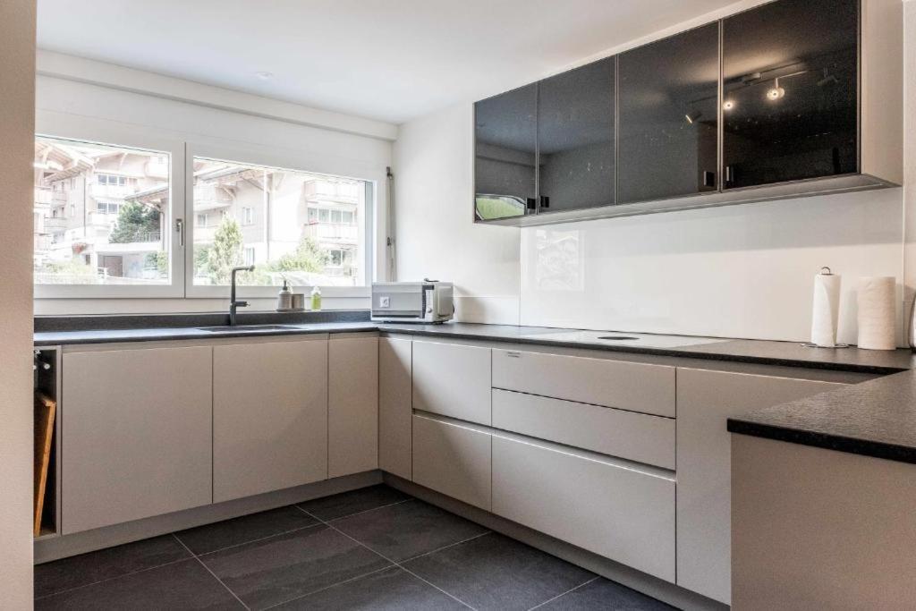 Eiger Panoramica - Aare Jungfrau Ag Apartment กรินเดลวัลด์ ภายนอก รูปภาพ